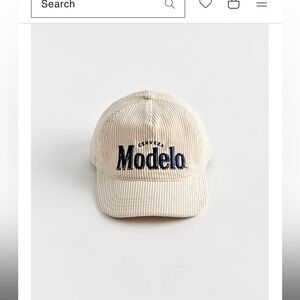 beige Modelo hat
